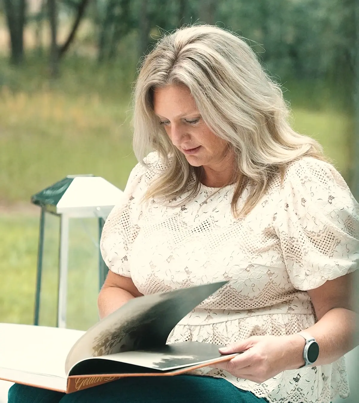 Cancer survivor Julie Dixon reads a book