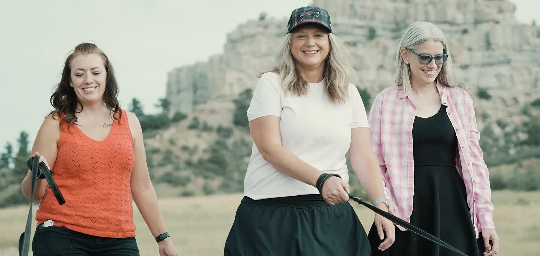 Julie Dixon on a hike with her dog and some friends