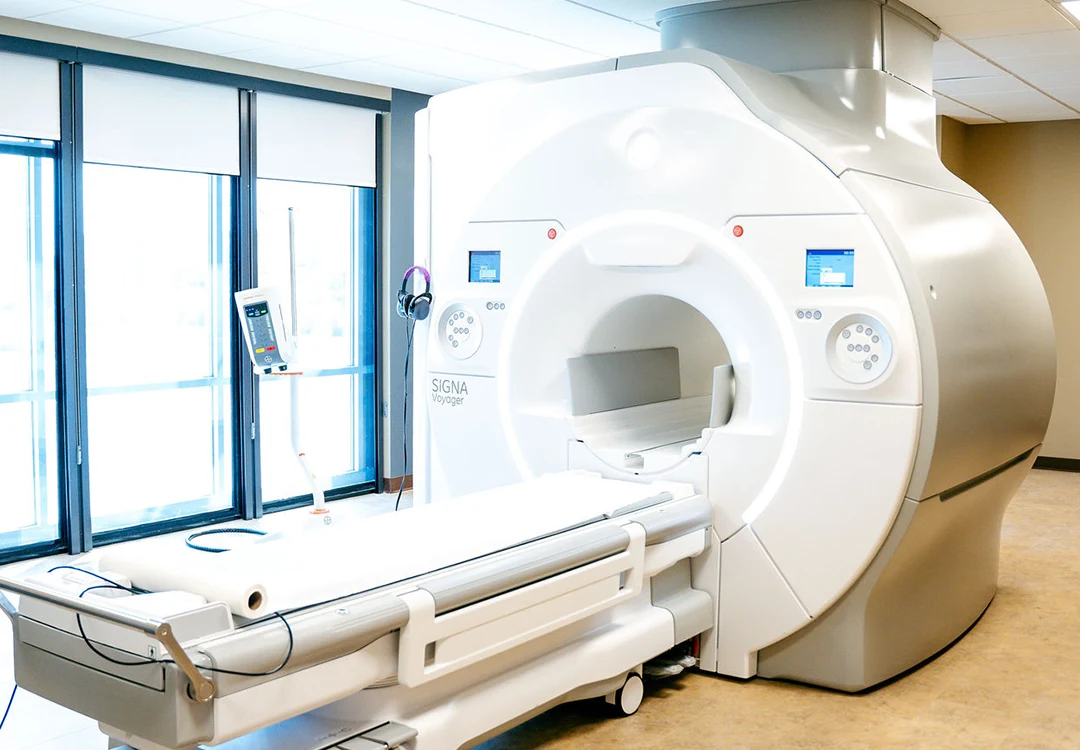 MRI scanner in a bright medical imaging room