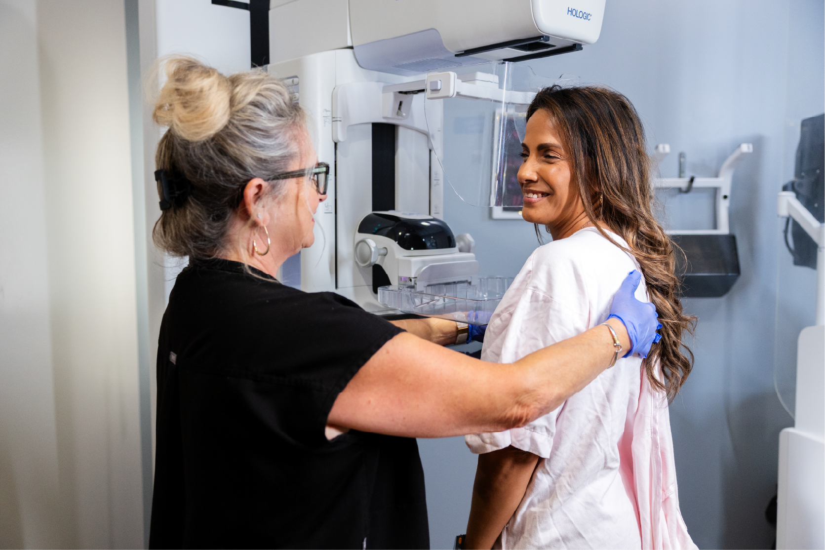 Denise getting a mammogram at a Envision Imaging center