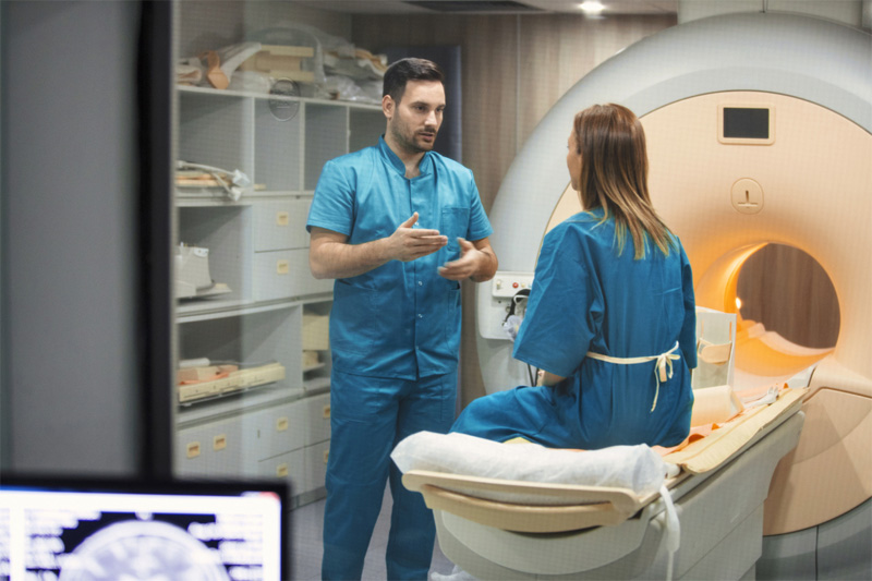 Radiologist talking with patient.